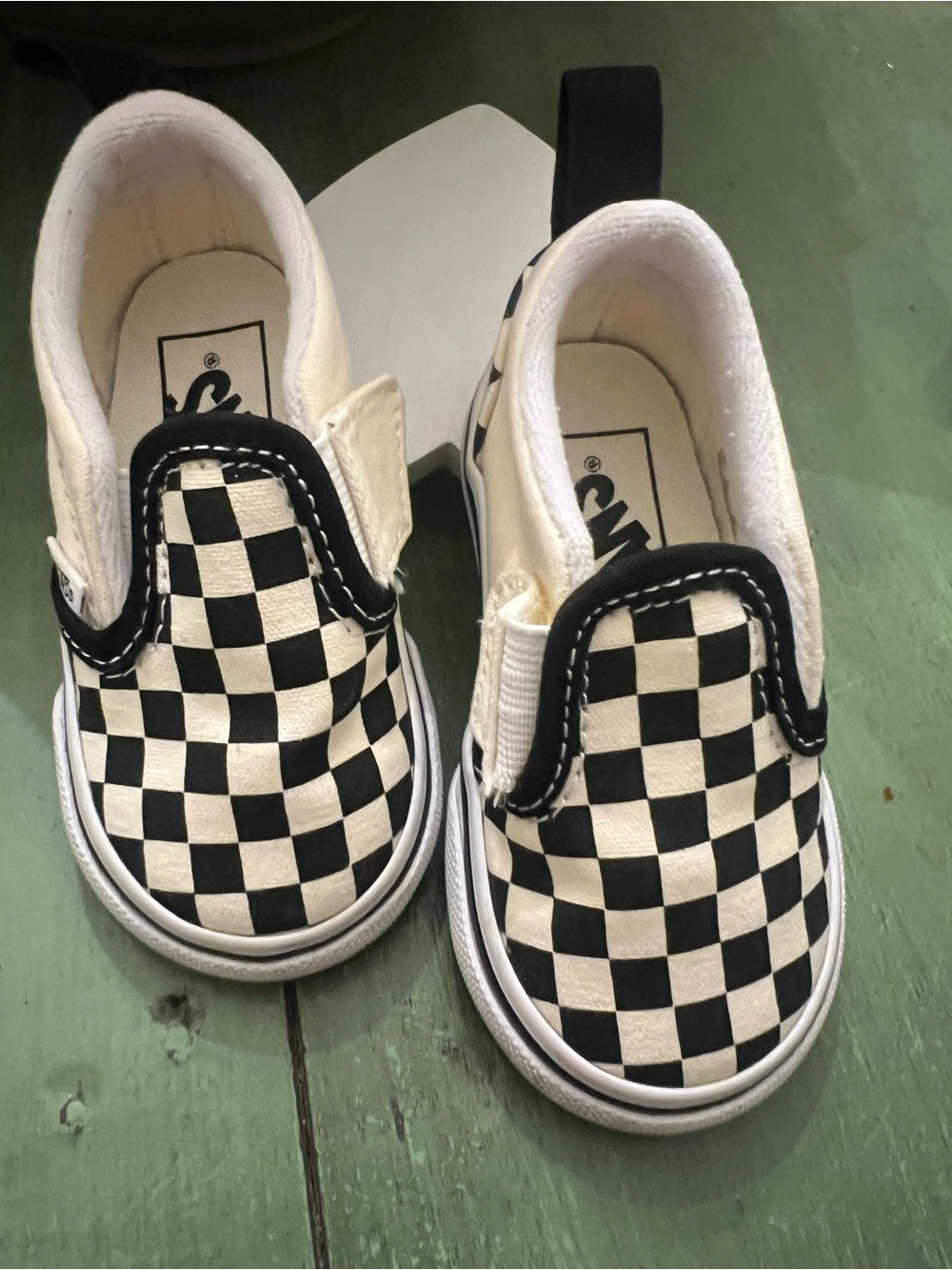 Vans Kids Slip-On Sneakers in Black and White Checkerboard size 4